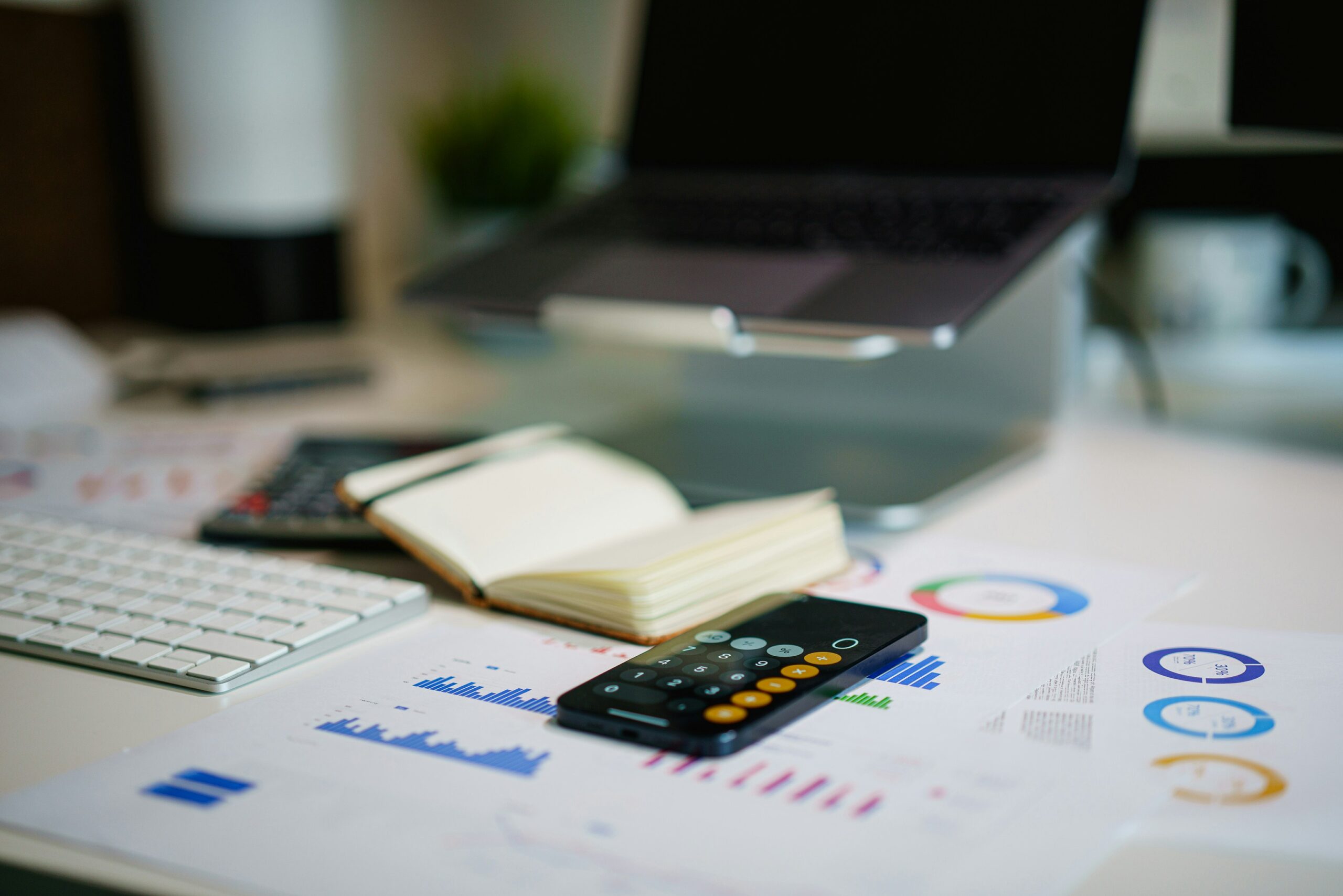 Table showing calculator and papers