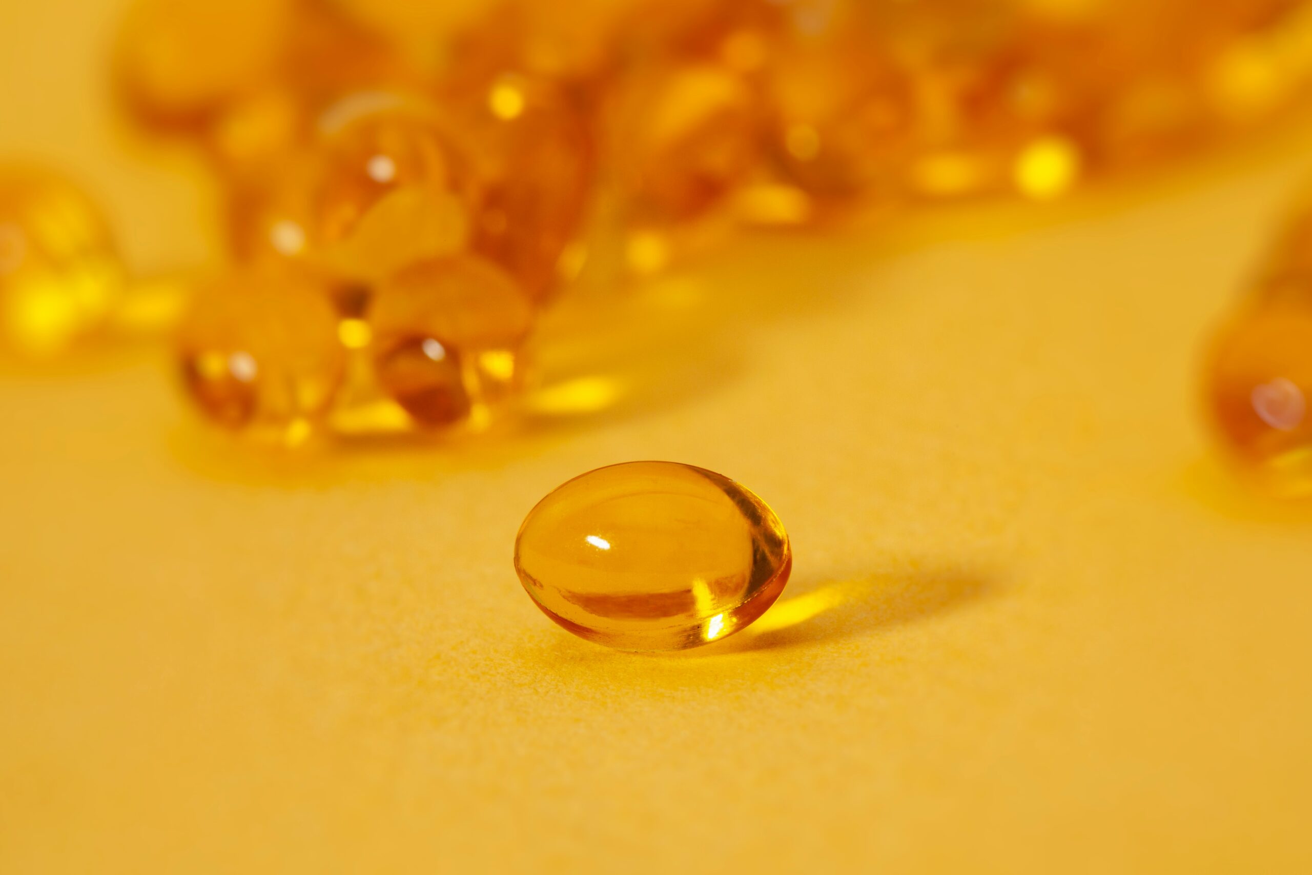 An image of some medicine on a yellow background