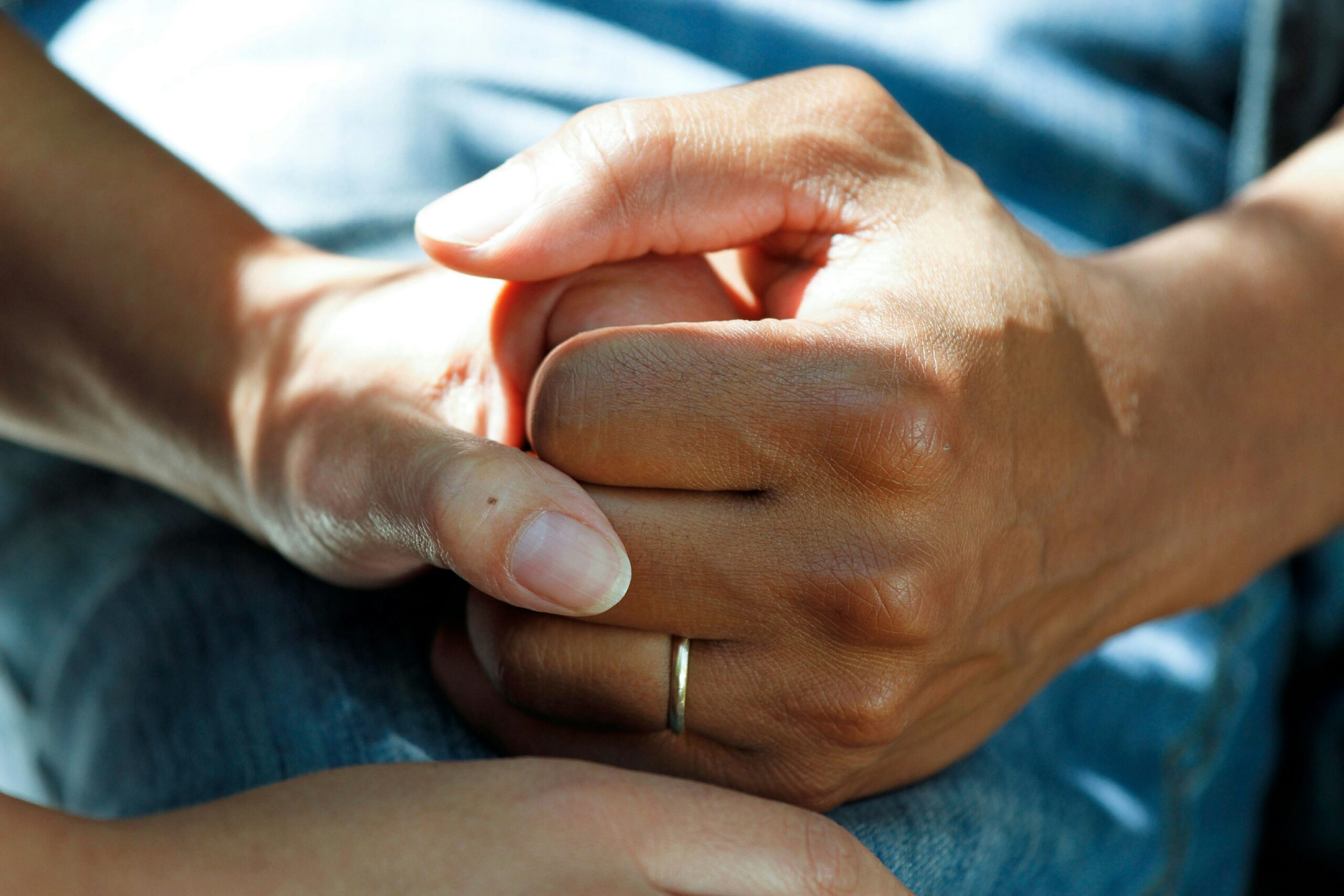 An image of a patient being supported by a relative